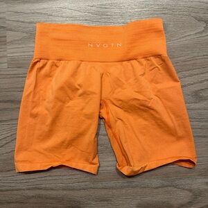 NVGTN Women's High-Rise Orange Bike Shorts